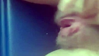 Blonde plays with big clit by window for orgasm hoping to get seen