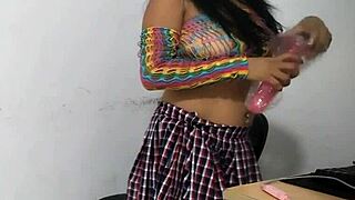 Woman riding a pink dildo in her beautiful pussy in front of the camera?