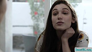 Blonde lesbians Bella Rolland and Lily Lou engage in intense 69 pussy licking