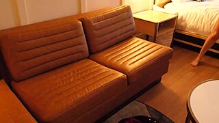 Horny hotwife flashes big tits and sucks stranger's big cock on vacation. She fucks him hard in hotel room.