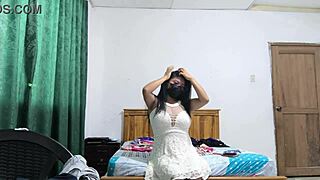 The busty executive picks a white dress and begins sensual movements revealing her beautiful features 😍👗