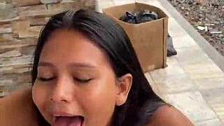 Scort gives public blowjob for 30 dollars to athletic Colombian babe in jeans outdoors