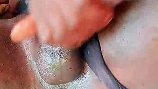 Sexyjayla254 ebony shemale strokes huge oiled cock outdoors