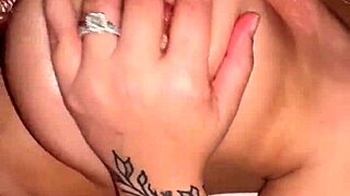 Couple enjoys shower blowjob leading to titty fuck. He cums on her big natural tits.