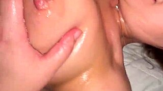 Couple enjoys shower blowjob leading to titty fuck. He cums on her big natural tits.