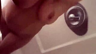 Couple enjoys shower blowjob leading to titty fuck. He cums on her big natural tits.