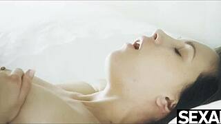 brunette babe with big tits gives blowjob then rides missionary to creampie orgasm in couple session. long legs wrap around during passionate fuck.