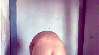 In a neutral scene, May from the state performs a simple striptease routine.