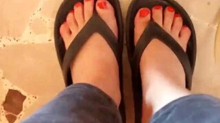 Greta Applies Nail Polish to Her Toenails