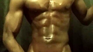 Watch This Muscular Bodybuilder With BBC Stroking His Monster Cock All Oiled Up Solo Until He Cums!
