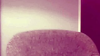 The amateur Japanese teen poses in red sexy shorts and see-through lingerie for a softcore shoot.