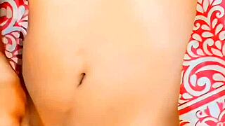 Feminine sissy in tight thong and miniskirt masturbates oiled body with small cock to orgasm