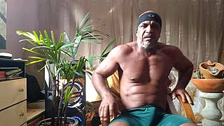 brazilian bear kojac strokes his huge hairy cock solo with armpit fetish tease