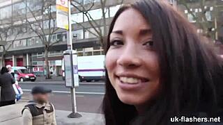 Horny British girl flashes and masturbates outdoors, fingering her shaved pussy in public exhibition.