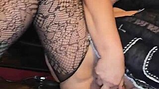 Sexy fishnets spread her ass cheeks wide open for viewing.