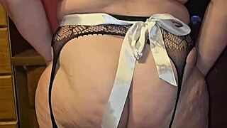 Sexy fishnets spread her ass cheeks wide open for viewing.