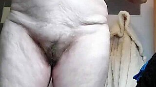 Granny stuffs hairy pussy with cucumber