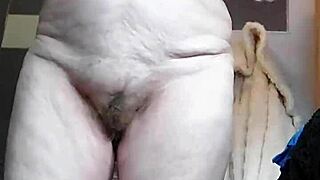 Granny stuffs hairy pussy with cucumber