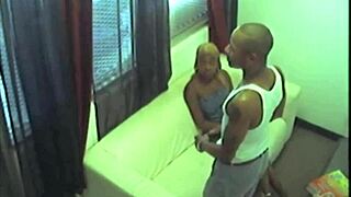 The hidden cam spies on a black babe slut delivering a blowjob before outdoor public fucking