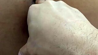 Amateur gets fingered in ass and pussy on bed