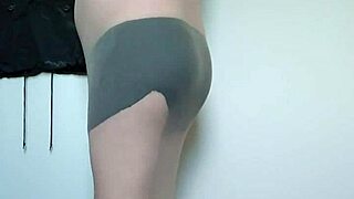 carmen nylonjunge wraps body in sheer nylons teasing