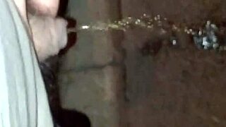 She sneaks out to pee on the quiet street at night