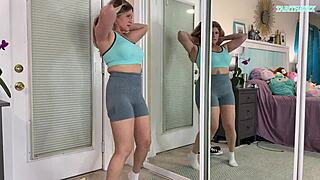 Sexy milf tries on tight gym clothes flashing her huge natural tits everywhere