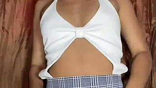 Wanna watch this innocent miniskirt girl finger her tight pussy?