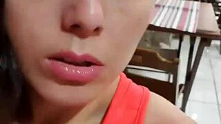 A Latina strolls publicly outdoors without panties flashing natural tits.