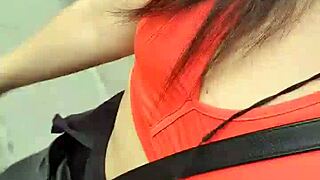 A Latina strolls publicly outdoors without panties flashing natural tits.