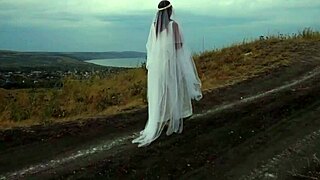 Hikers Reach Hilltop for Relaxed Outdoor Adventure