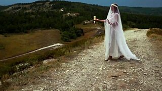 Hikers Reach Hilltop for Relaxed Outdoor Adventure