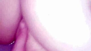 naked babe plays wet pussy closeup in steamy bathtub solo