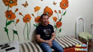 Tattooed African ass on German sofa craves oral pounding