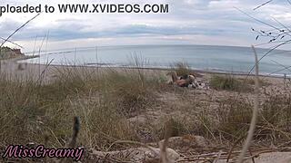 French teacher secretly blows stranger on nude beach?