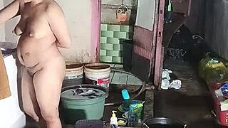Indonesian housewife washes clothes while masturbating big pussy