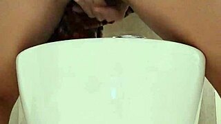 she sneaks anal play in the family bathroom then squirts everywhere