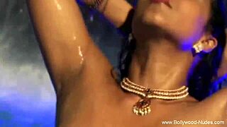 pretty asian woman dances while cleansing her naked body teasing softly