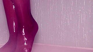 nylon-clad feet tease and soak in the steamy shower