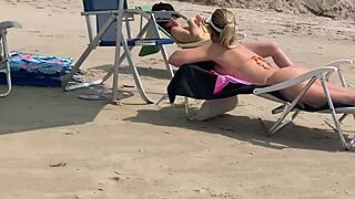she handjobs to cum refusing stop amid beach crowd