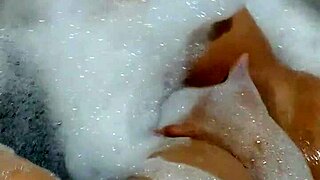 hot brazilian milf masturbates wildly in motel tub with giant dildo till squirting orgasm