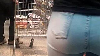 Brunette's juicy ass shakes in tight jeans at the market