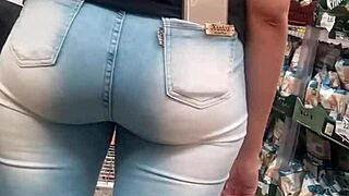 Brunette's juicy ass shakes in tight jeans at the market