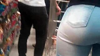 Brunette's juicy ass shakes in tight jeans at the market