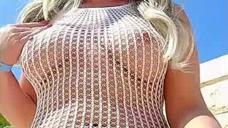 blonde slut flashes big tits in see-through dress public outdoor
