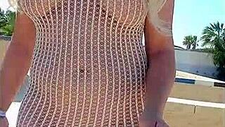 blonde slut flashes big tits in see-through dress public outdoor