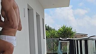 Fucking Tommy Cabrio balcony-style while neighbors stare hungrily!