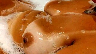 Tanned Stepsister Plays with Big Tits and Wet Pussy in Bathroom