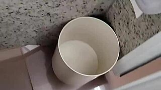 A man enters the public bathroom toilet for a solo handjob session outdoors amid amateur vibes