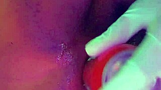 ebony babe gaps her pussy wide with huge insertions